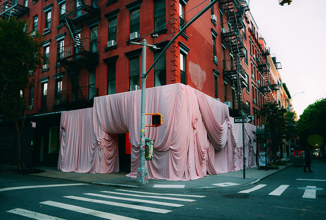 Andres reisinger shrouds hourglass cosmetics` NYC popup in a rosy blush veil