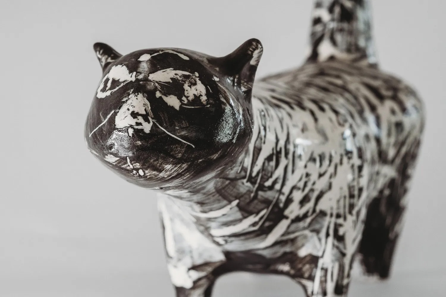 A UK auction house is offering up a rare ceramic cat made by a young David Hockney