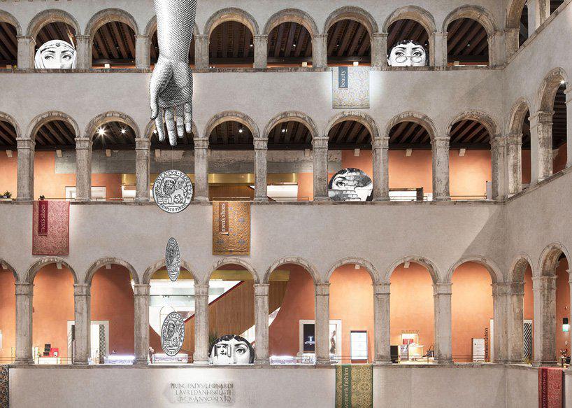 fornasetti s iconic figures take over the fondaco dei tedeschi store in venice