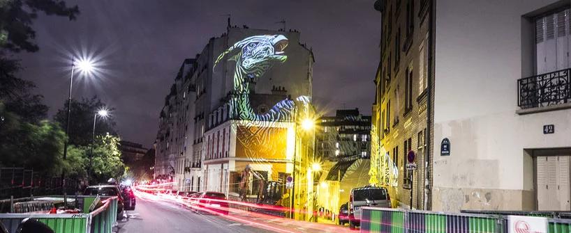 giant holographic dinosaurs take over paris streets for julien nonnons prehistoric safari
