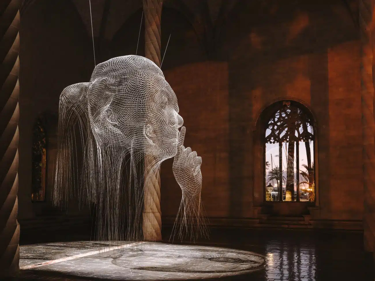 Jaume Plensa`s Giant Mesh Steel Sculptures Hauntingly Request Silence in Historic Gothic Building