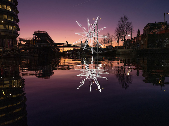 Polaris glowing star installation lights up in the heart of amsterdam